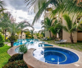 Colorful classy modern split level unit near beach in Coco with pool