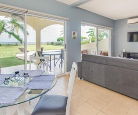 Updated 2-bedroom condo on beach with pool